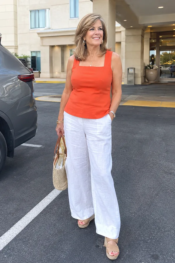 Bright Orange Top With Crisp White Wide Leg Pants