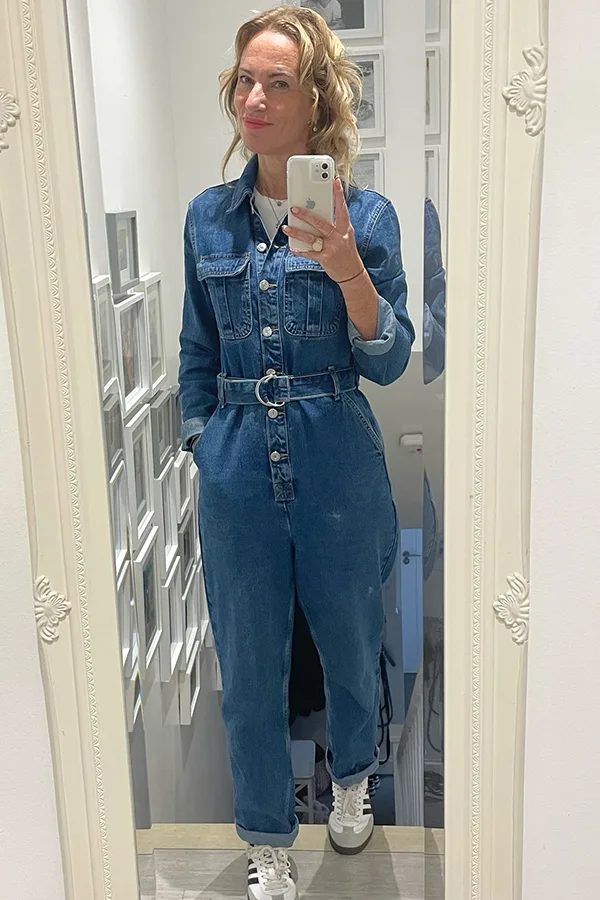 Classic Dark Denim Jumpsuit With White Sneakers