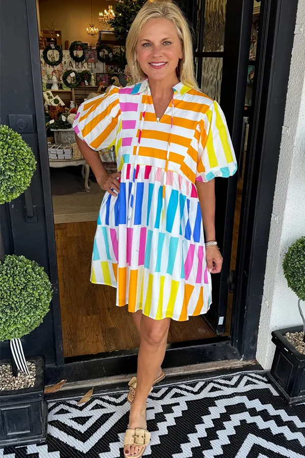 Colorful Striped Tunic Dress With A Playful Finish