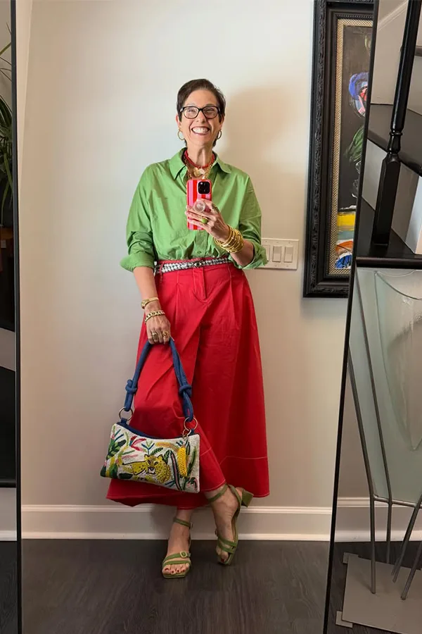 Green Blouse With A Bright Red Skirt